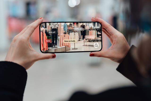 Mobile device showing augmented reality application in retail store