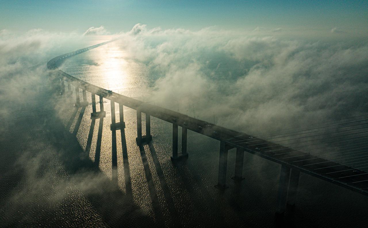 Foggy morning in Lisbon, bridge Vasco da Gama