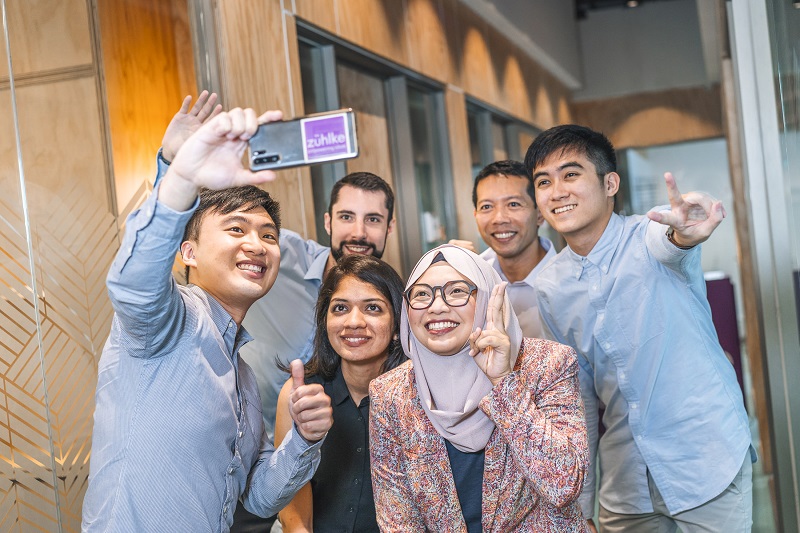 Zühlke employees taking a picture together at the Singapore office